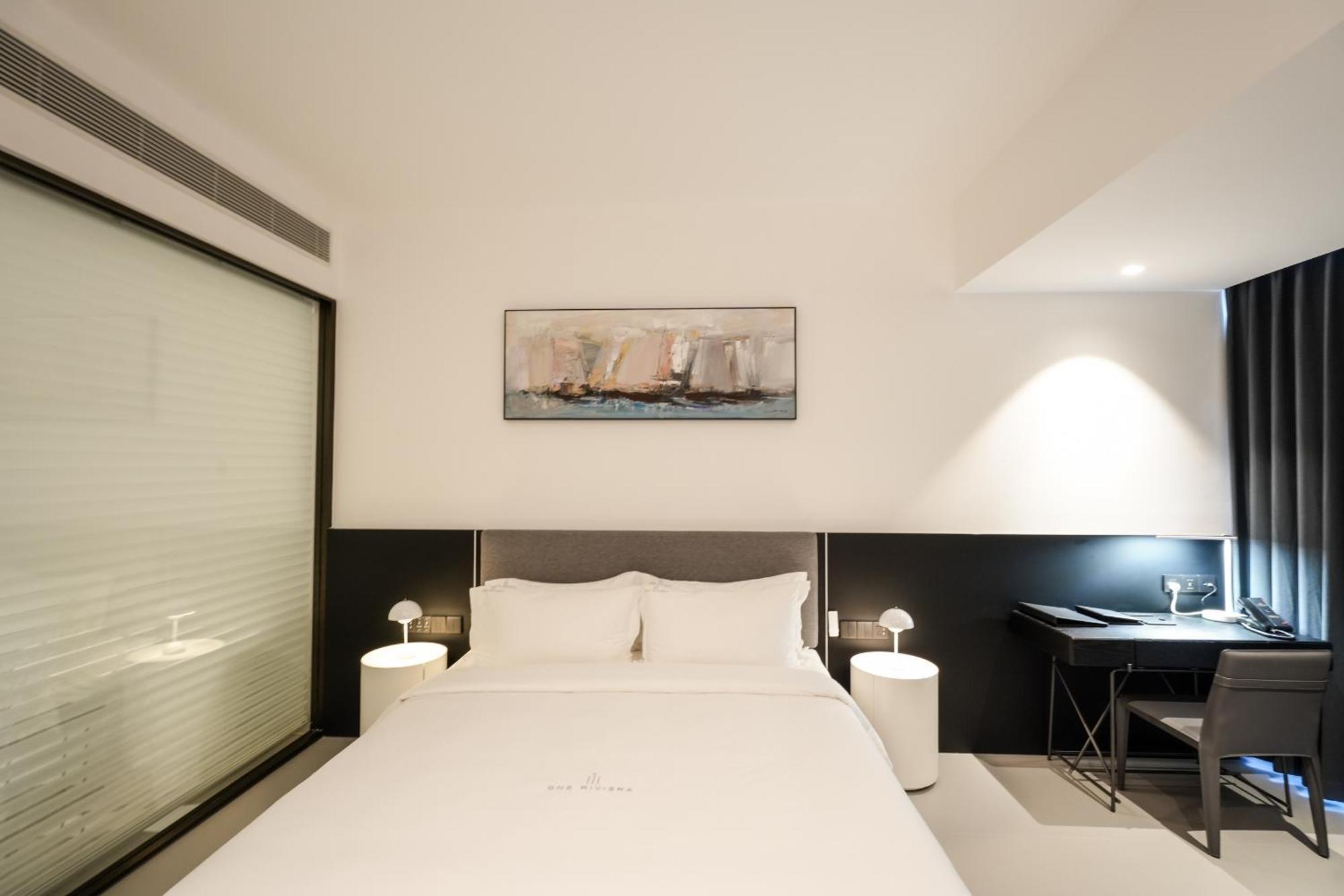 One Riviera Hotel And Residences Ban Souanmone Exteriör bild